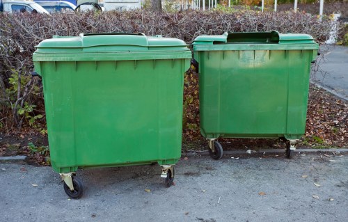 Workers clearing builders waste in Crouchend